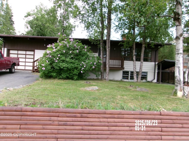 5731 College Dr, Anchorage, AK 99504 - view of green lawn with an outdoor structure and a detached garage