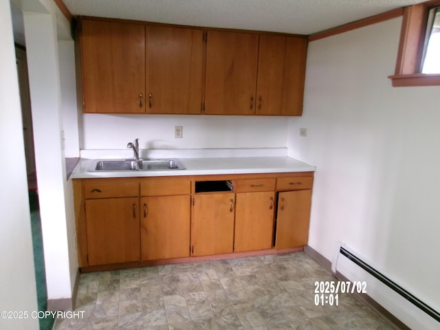 5731 College Dr, Anchorage, AK 99504 - kitchen with a baseboard heating unit, light countertops, and brown cabinets