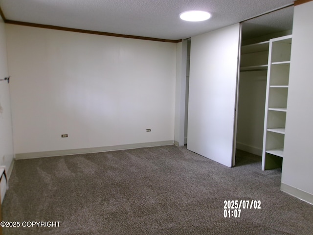 5731 College Dr, Anchorage, AK 99504 - unfurnished bedroom featuring carpet flooring, a textured ceiling, and a closet