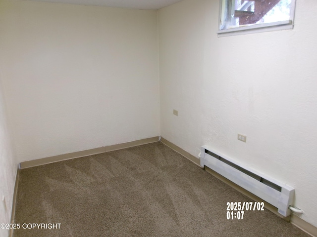 5731 College Dr, Anchorage, AK 99504 - carpeted empty room featuring a baseboard radiator