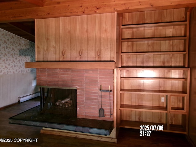 5731 College Dr, Anchorage, AK 99504 - detailed view of a baseboard heating unit, wood finished floors, a tile fireplace, and wallpapered walls
