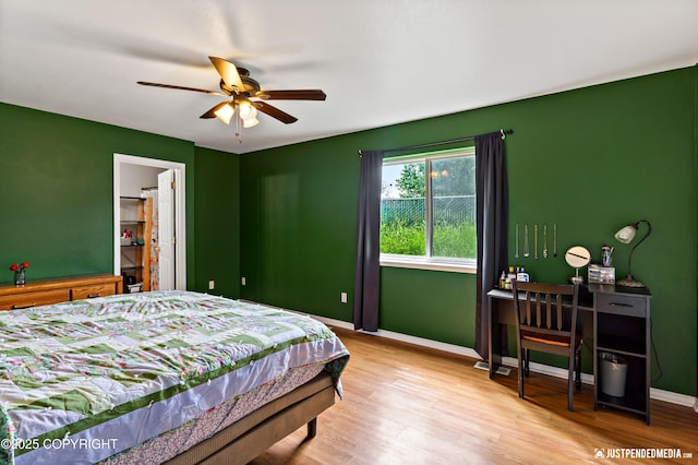 2666 Lauren Creek Loop # 23, Anchorage, AK 99507 - bedroom featuring wood finished floors and ceiling fan