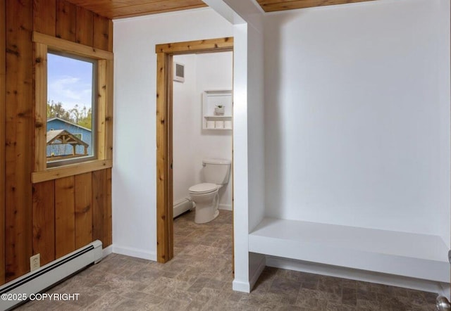 8011 Stewart Mountain Dr, Eagle River, AK 99577 - bathroom with baseboard heating, wooden walls, and wooden ceiling