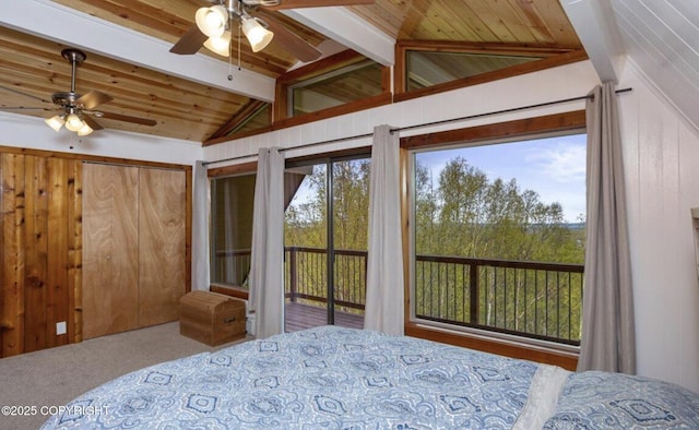 8011 Stewart Mountain Dr, Eagle River, AK 99577 - bedroom with carpet floors, access to exterior, and wooden walls