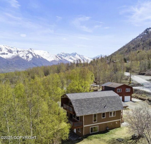8011 Stewart Mountain Dr, Eagle River, AK 99577 - mountain view featuring a forest