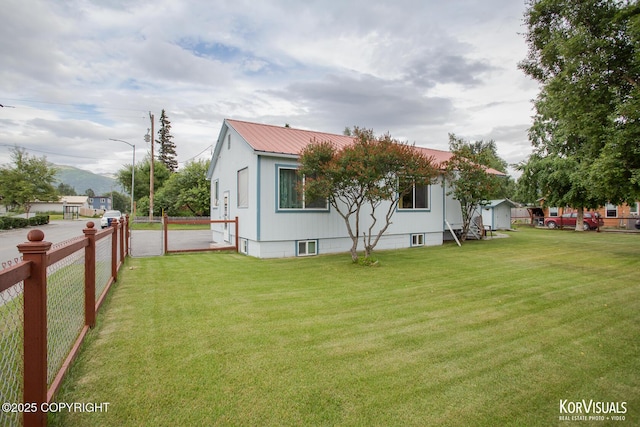 203 S Cobb St, Palmer, AK 99645 - view of home's exterior with a metal roof