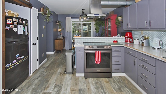 213 Lee Dr, Homer, AK 99603 - kitchen with stainless steel electric stove, gray cabinetry, tasteful backsplash, and freestanding refrigerator