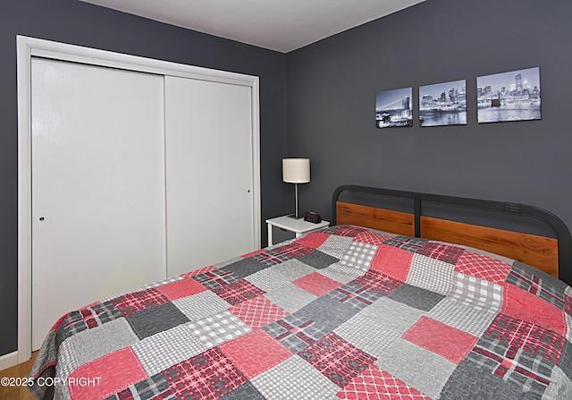213 Lee Dr, Homer, AK 99603 - bedroom with a closet and wood finished floors