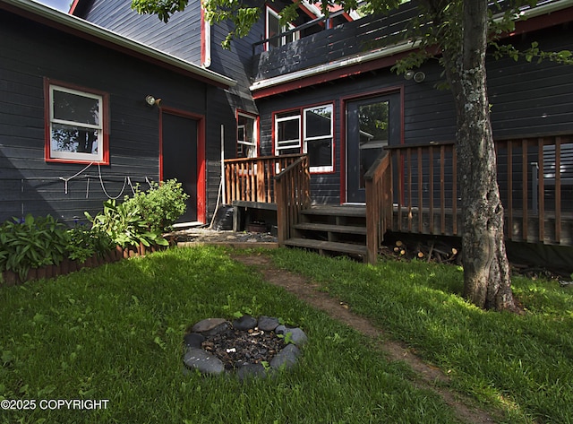 213 Lee Dr, Homer, AK 99603 - back of property with a deck and a yard