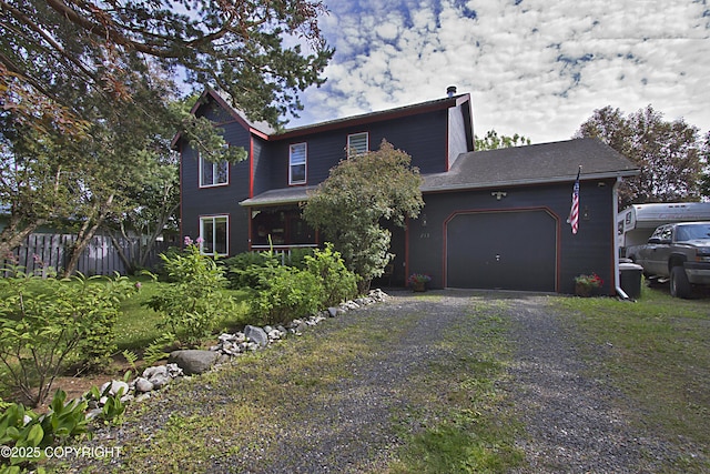 213 Lee Dr, Homer, AK 99603 - view of front facade featuring an attached garage and driveway