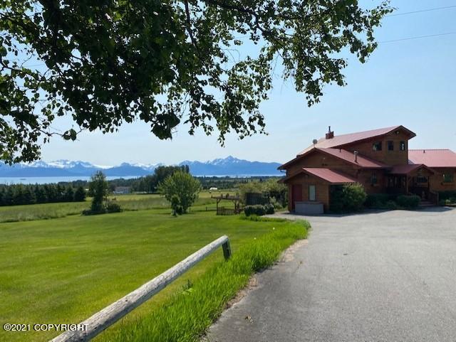 60871 Bear Creek Dr, Homer, AK 99603 - view of asphalt driveway featuring a view of countryside