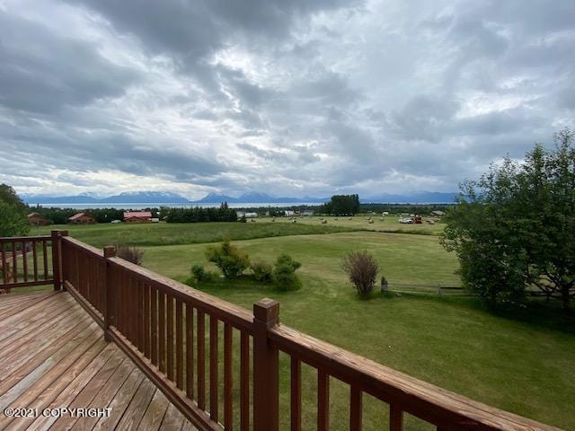 60871 Bear Creek Dr, Homer, AK 99603 - wooden terrace featuring a yard