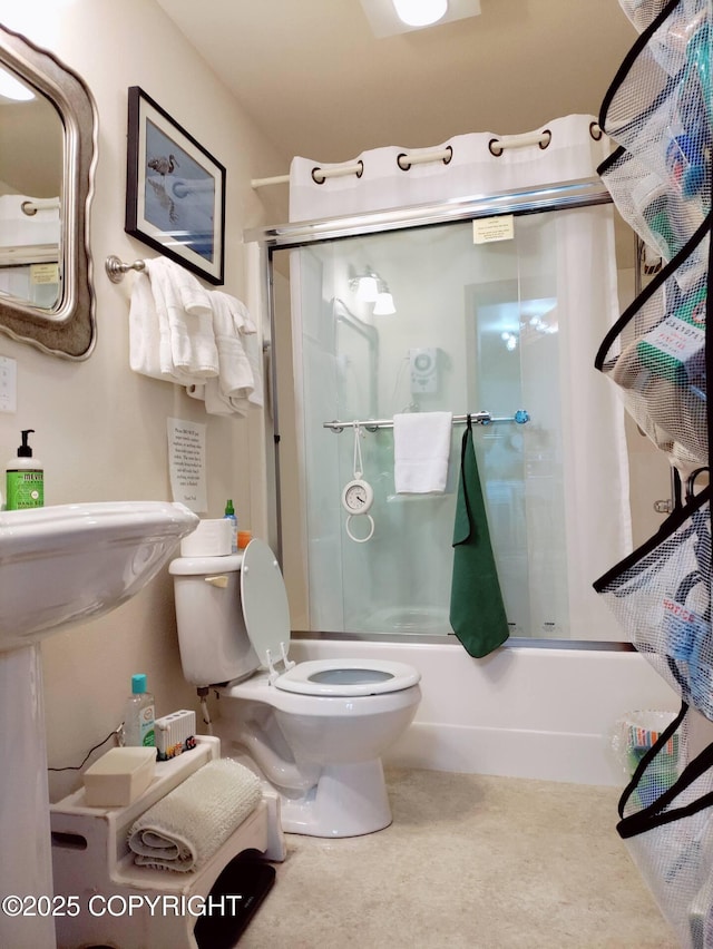 60871 Bear Creek Dr, Homer, AK 99603 - bathroom with toilet and enclosed tub / shower combo