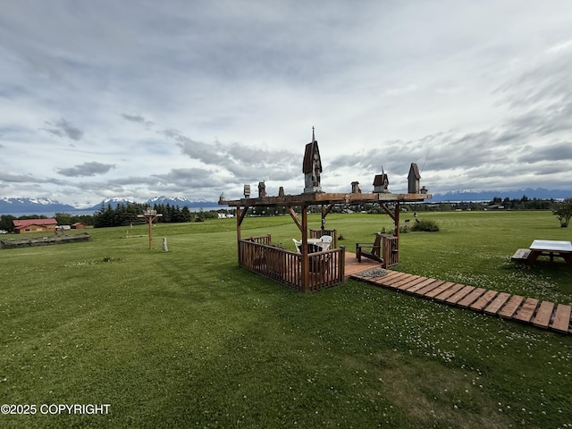 60871 Bear Creek Dr, Homer, AK 99603 - view of grassy yard featuring a mountain view
