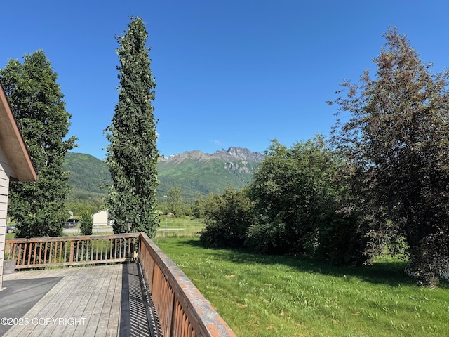 16297 E Harter Dr, Palmer, AK 99645 - deck featuring a mountain view and a yard
