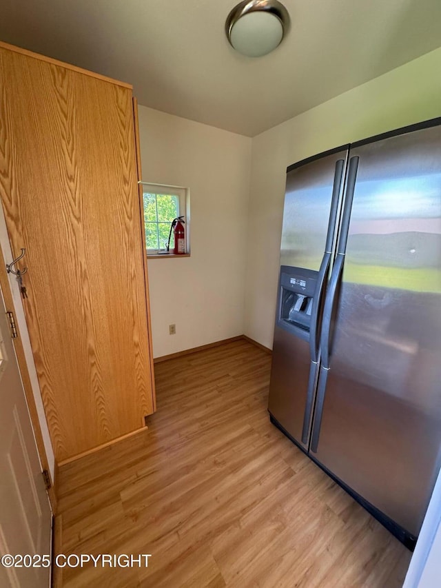 16297 E Harter Dr, Palmer, AK 99645 - kitchen featuring stainless steel fridge with ice dispenser and light wood-style floors