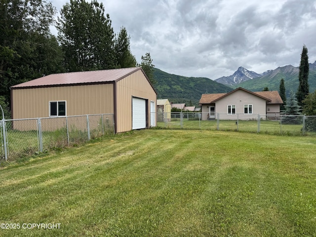 16297 E Harter Dr, Palmer, AK 99645 - view of yard featuring a mountain view, an outbuilding, and a detached garage