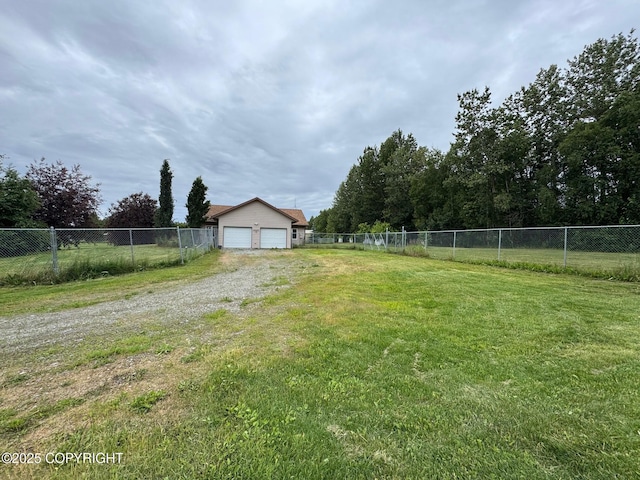 16297 E Harter Dr, Palmer, AK 99645 - view of yard featuring a detached garage