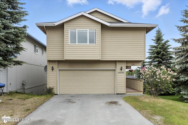 10300 Ridge Park Dr, Anchorage, AK 99507 - view of front of house with asphalt driveway and an attached garage