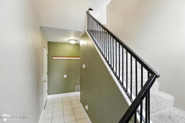 10300 Ridge Park Dr, Anchorage, AK 99507 - stairway featuring tile patterned floors and baseboards