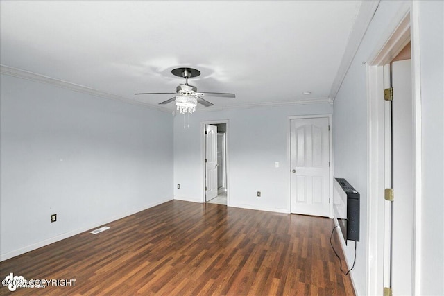 10300 Ridge Park Dr, Anchorage, AK 99507 - unfurnished living room featuring crown molding, ceiling fan, wood finished floors, and heating unit
