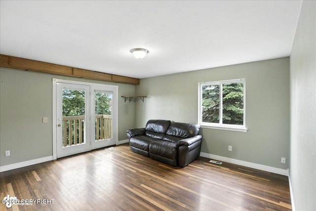 10300 Ridge Park Dr, Anchorage, AK 99507 - living area with plenty of natural light and hardwood / wood-style flooring