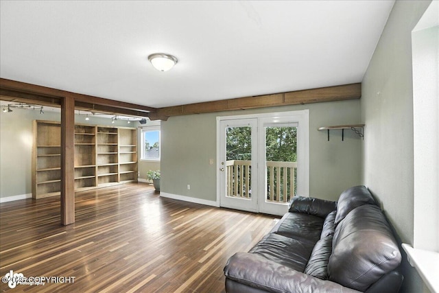 10300 Ridge Park Dr, Anchorage, AK 99507 - living room with wood finished floors and built in shelves