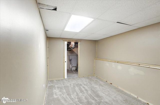 10300 Ridge Park Dr, Anchorage, AK 99507 - carpeted empty room featuring a drop ceiling and baseboards