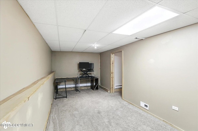 10300 Ridge Park Dr, Anchorage, AK 99507 - office space with carpet floors, a paneled ceiling, and a baseboard heating unit
