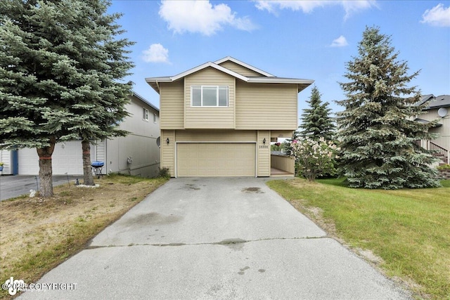 10300 Ridge Park Dr, Anchorage, AK 99507 - view of front of house featuring driveway, a garage, and a front lawn