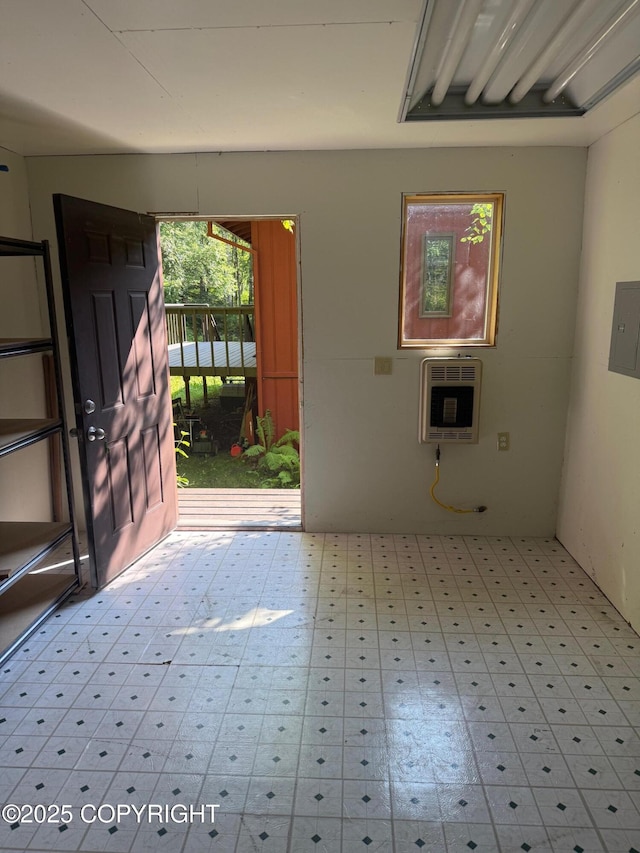 4261 E Foxtrot Ave, Wasilla, AK 99654 - foyer entrance with heating unit, electric panel, and tile patterned floors
