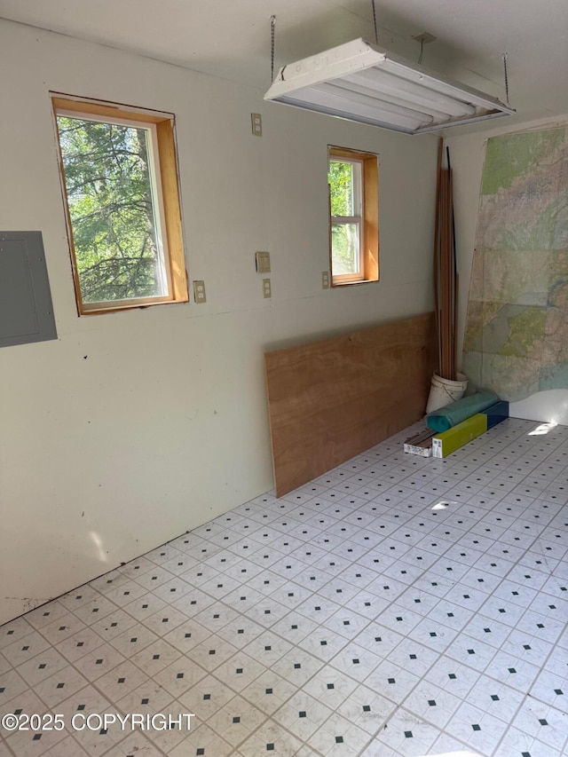 4261 E Foxtrot Ave, Wasilla, AK 99654 - unfurnished room featuring electric panel and light floors