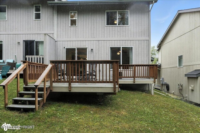 20454 Icefall Dr, Eagle River, AK 99577 - back of property with a wooden deck and a yard