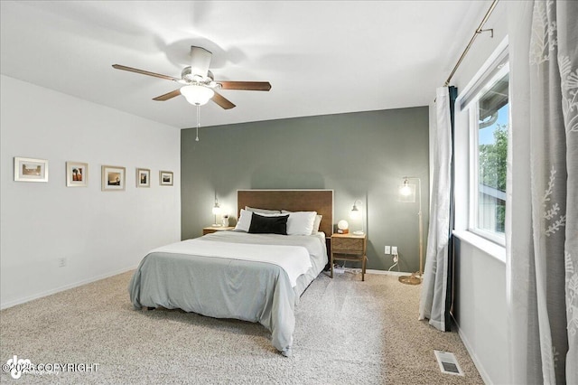 20454 Icefall Dr, Eagle River, AK 99577 - carpeted bedroom with baseboards and a ceiling fan