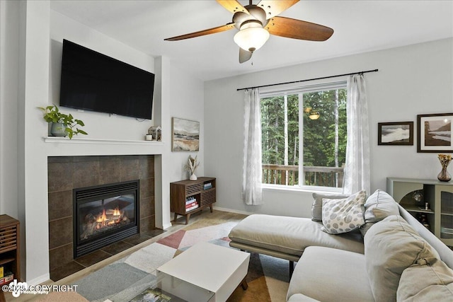 20454 Icefall Dr, Eagle River, AK 99577 - living area with a tile fireplace and ceiling fan