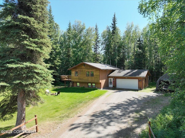 2701 Julie Ln, North Pole, AK 99705 - tri-level home with dirt driveway and a front yard
