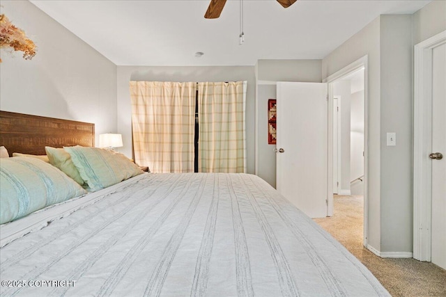 2701 Julie Ln, North Pole, AK 99705 - carpeted bedroom with baseboards and a ceiling fan