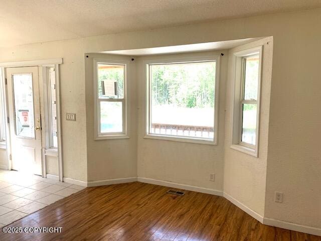 7367 S Rubacaba St, Wasilla, AK 99623 - spare room featuring wood finished floors