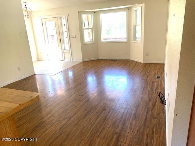 7367 S Rubacaba St, Wasilla, AK 99623 - unfurnished room featuring wood finished floors and baseboards