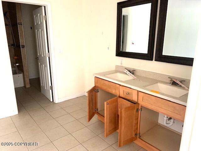 7367 S Rubacaba St, Wasilla, AK 99623 - full bathroom with double vanity and tile patterned floors