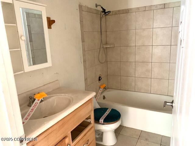 7367 S Rubacaba St, Wasilla, AK 99623 - full bathroom with vanity, shower / bath combination, and tile patterned floors
