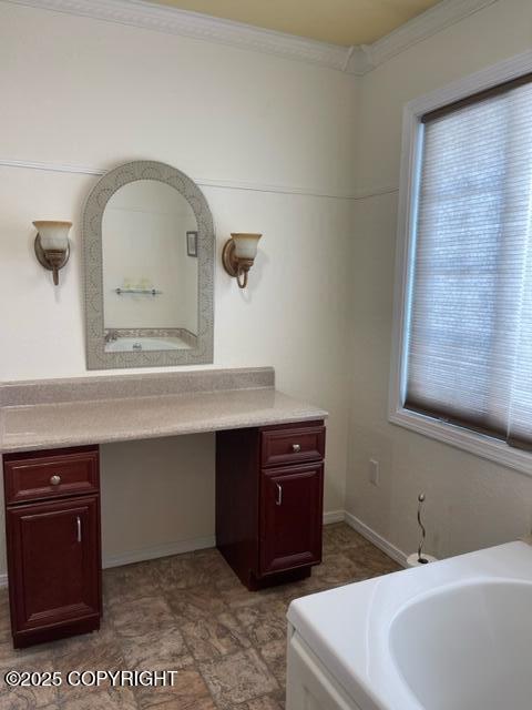 8430 Greenhill Way, Anchorage, AK 99502 - bathroom featuring vanity, crown molding, and a bathtub