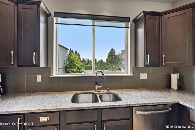 11459 Moonrise Ridge Pl # 7, Anchorage, AK 99516 - kitchen featuring dishwasher, dark brown cabinetry, decorative backsplash, and light stone countertops
