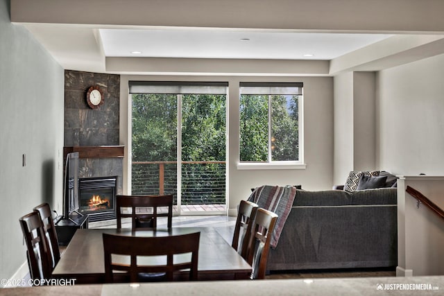 11459 Moonrise Ridge Pl # 7, Anchorage, AK 99516 - dining area featuring a high end fireplace