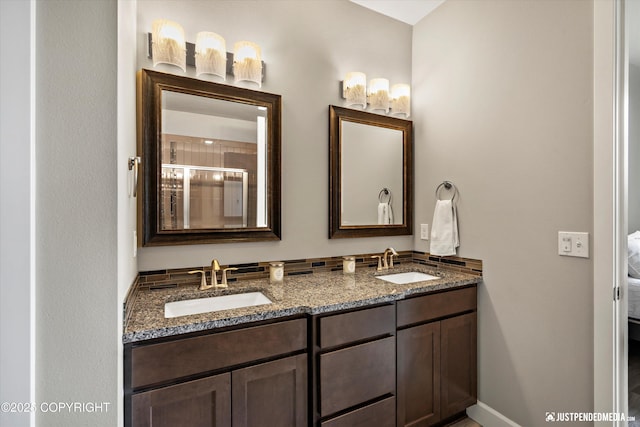 11459 Moonrise Ridge Pl # 7, Anchorage, AK 99516 - ensuite bathroom with double vanity and a shower with door