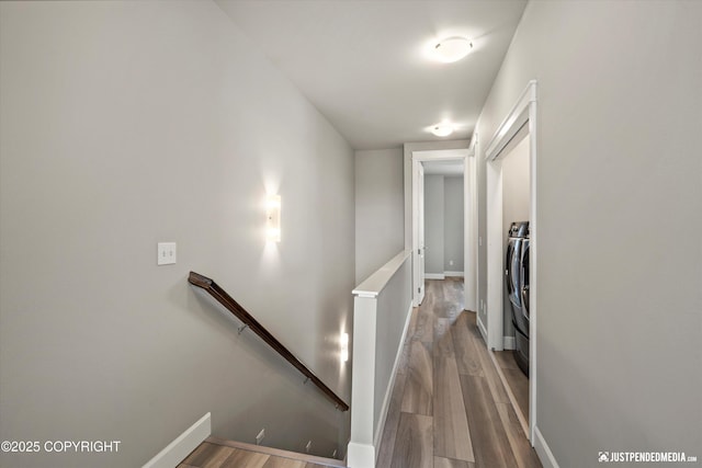 11459 Moonrise Ridge Pl # 7, Anchorage, AK 99516 - corridor featuring an upstairs landing and wood finished floors