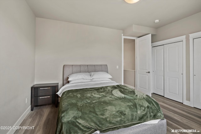 11459 Moonrise Ridge Pl # 7, Anchorage, AK 99516 - bedroom with wood finished floors and baseboards