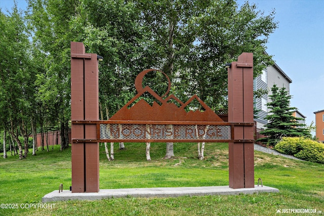11459 Moonrise Ridge Pl # 7, Anchorage, AK 99516 - community sign featuring a yard