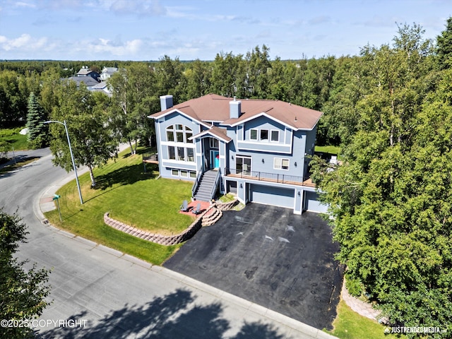 2231 Shore Dr, Anchorage, AK 99515 - aerial view of property and surrounding area featuring a heavily wooded area