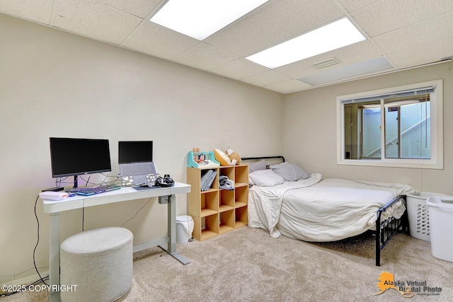 7521 Labrador Cir, Anchorage, AK 99502 - bedroom featuring a drop ceiling, carpet floors, and a desk
